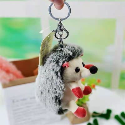 O luxuoso bonito da corrente chave do ouriço do luxuoso brinca a porta-chaves pequena do bicho de pelúcia do ouriço